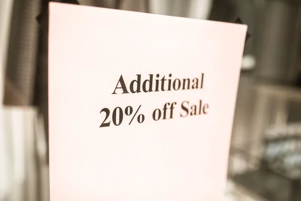 Sale sign reading Additional 20% off Sale